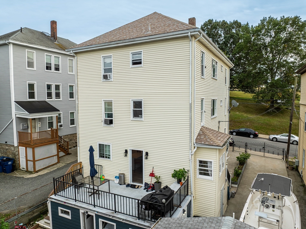 166 Bradford Avenue Fall River, MA 02721 - Photo 4 of 42 a view of multiple house with balcony