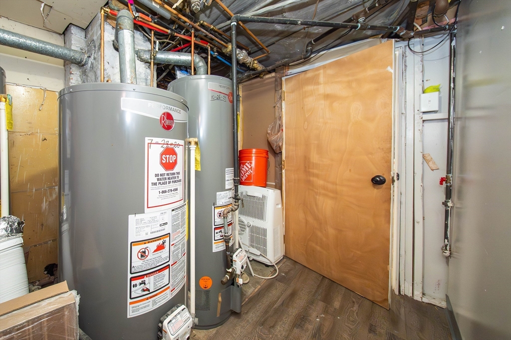 166 Bradford Avenue Fall River, MA 02721 - Photo 41 of 42 a utility room with fridge dryer and washer