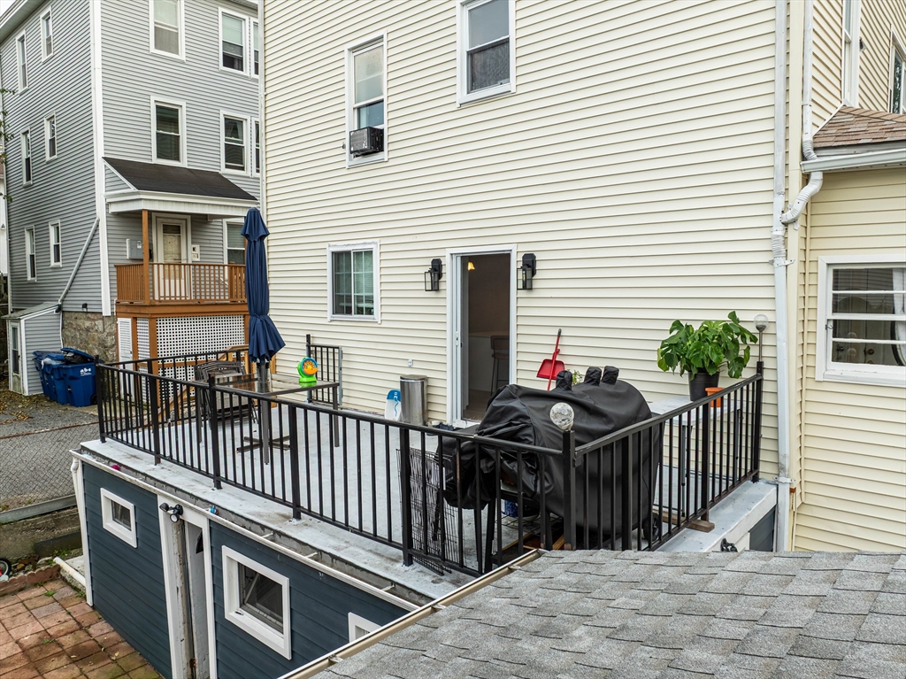 166 Bradford Avenue Fall River, MA 02721 - Photo 5 of 42 a front view of house yard with seating space