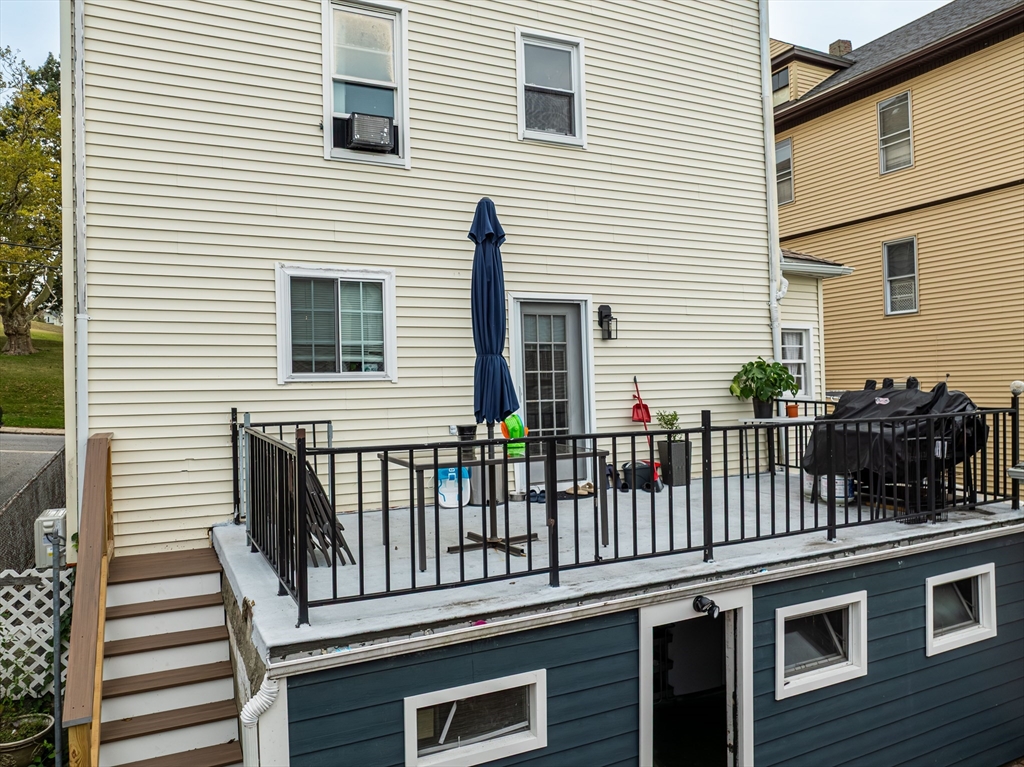 166 Bradford Avenue Fall River, MA 02721 - Photo 7 of 42 a view of a house with a deck