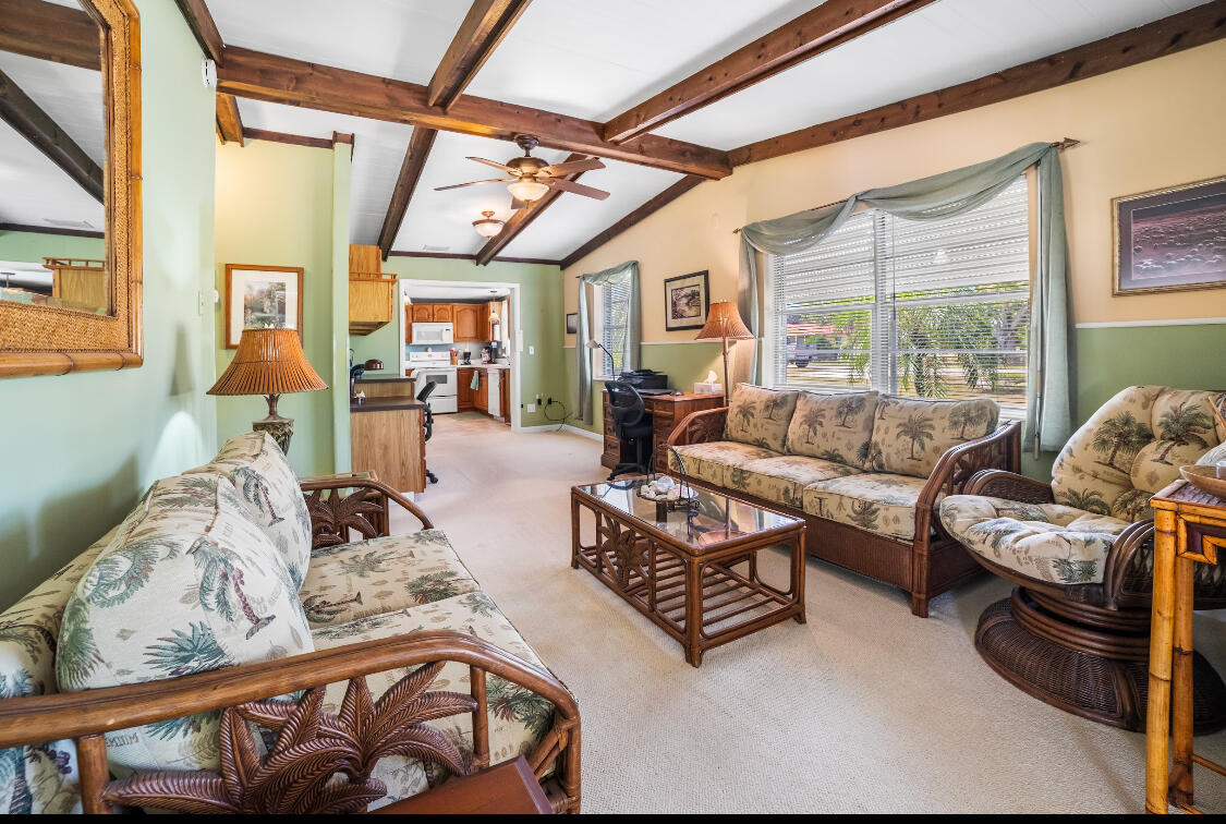 3966 Northwest 20th Avenue Okeechobee, FL 34972 - Photo 14 of 35 a living room with furniture and a large window