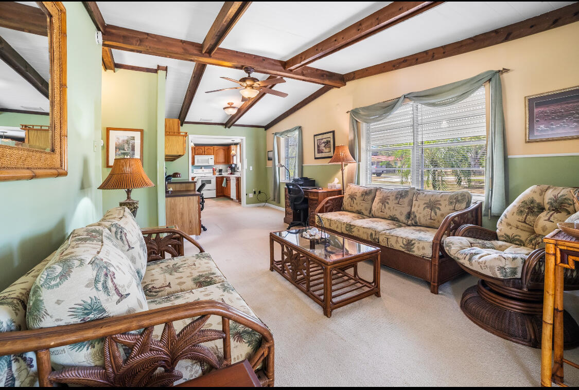 3966 Northwest 20th Avenue Okeechobee, FL 34972 - Photo 15 of 35 a living room with furniture and a large window
