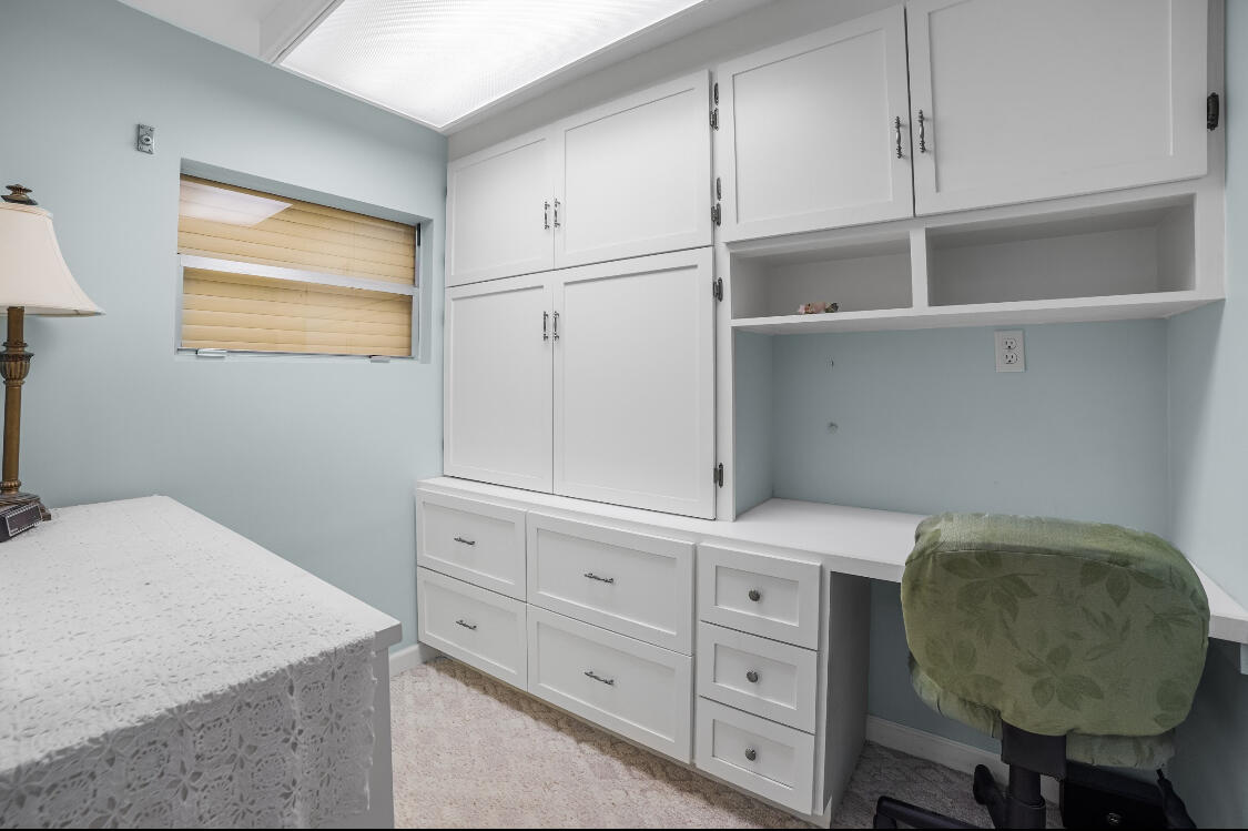 3966 Northwest 20th Avenue Okeechobee, FL 34972 - Photo 20 of 35 a workspace with cabinets