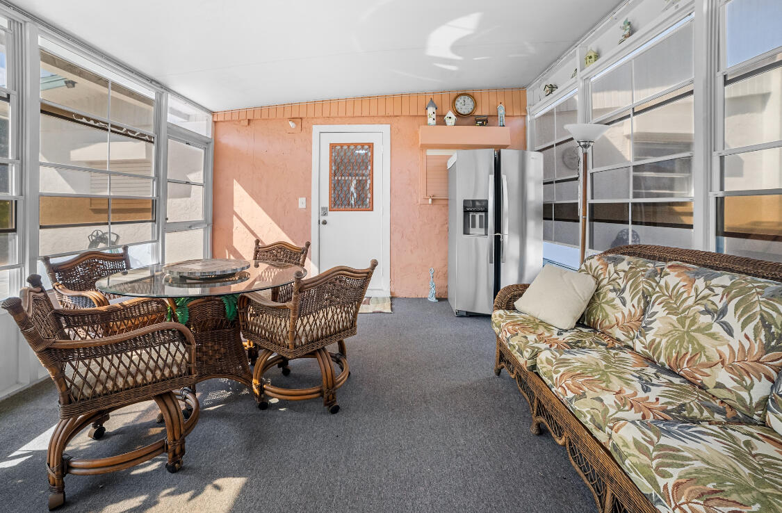 3966 Northwest 20th Avenue Okeechobee, FL 34972 - Photo 24 of 35 a living room with furniture and a window