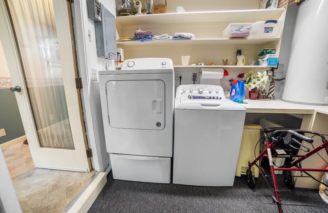 3966 Northwest 20th Avenue Okeechobee, FL 34972 - Photo 27 of 35 a utility room with dryer and washer