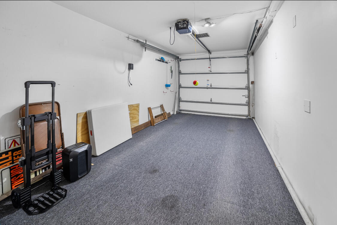 3966 Northwest 20th Avenue Okeechobee, FL 34972 - Photo 28 of 35 a view of a storage & utility room with lots of stuff