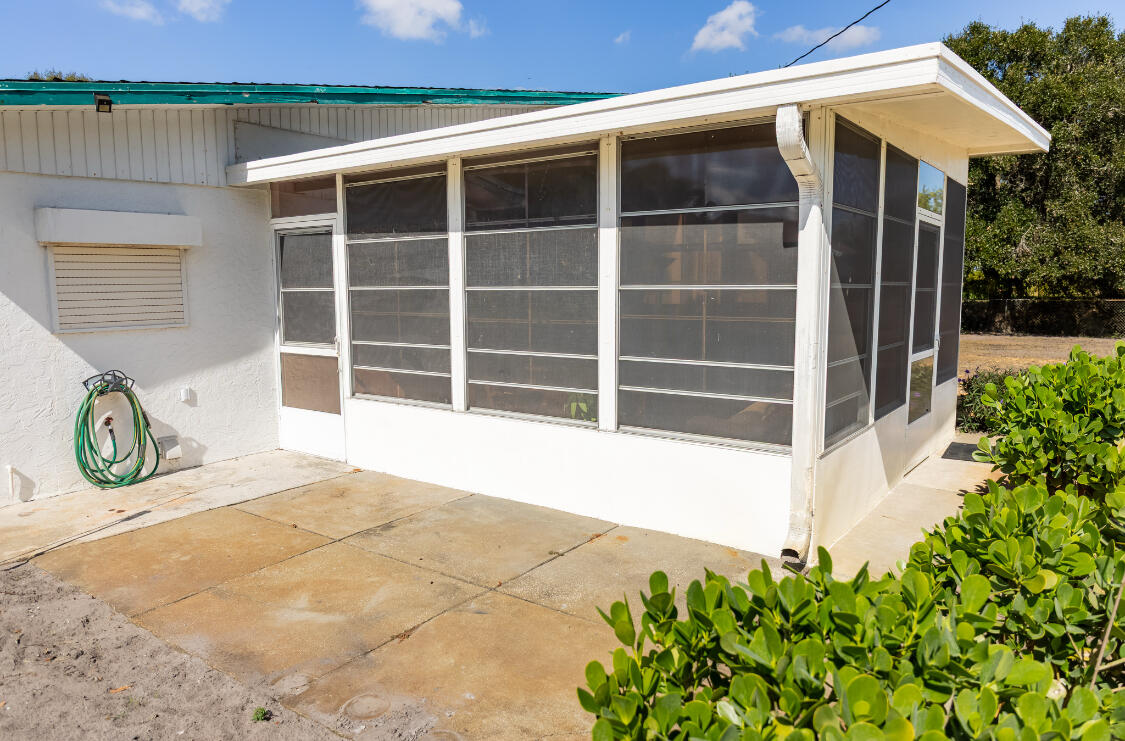 3966 Northwest 20th Avenue Okeechobee, FL 34972 - Photo 31 of 35 a house view with a garden space