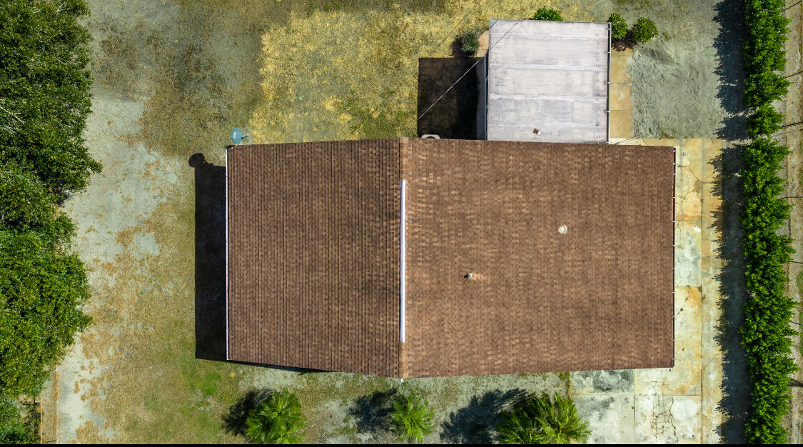 3966 Northwest 20th Avenue Okeechobee, FL 34972 - Photo 34 of 35 an aerial view of a house