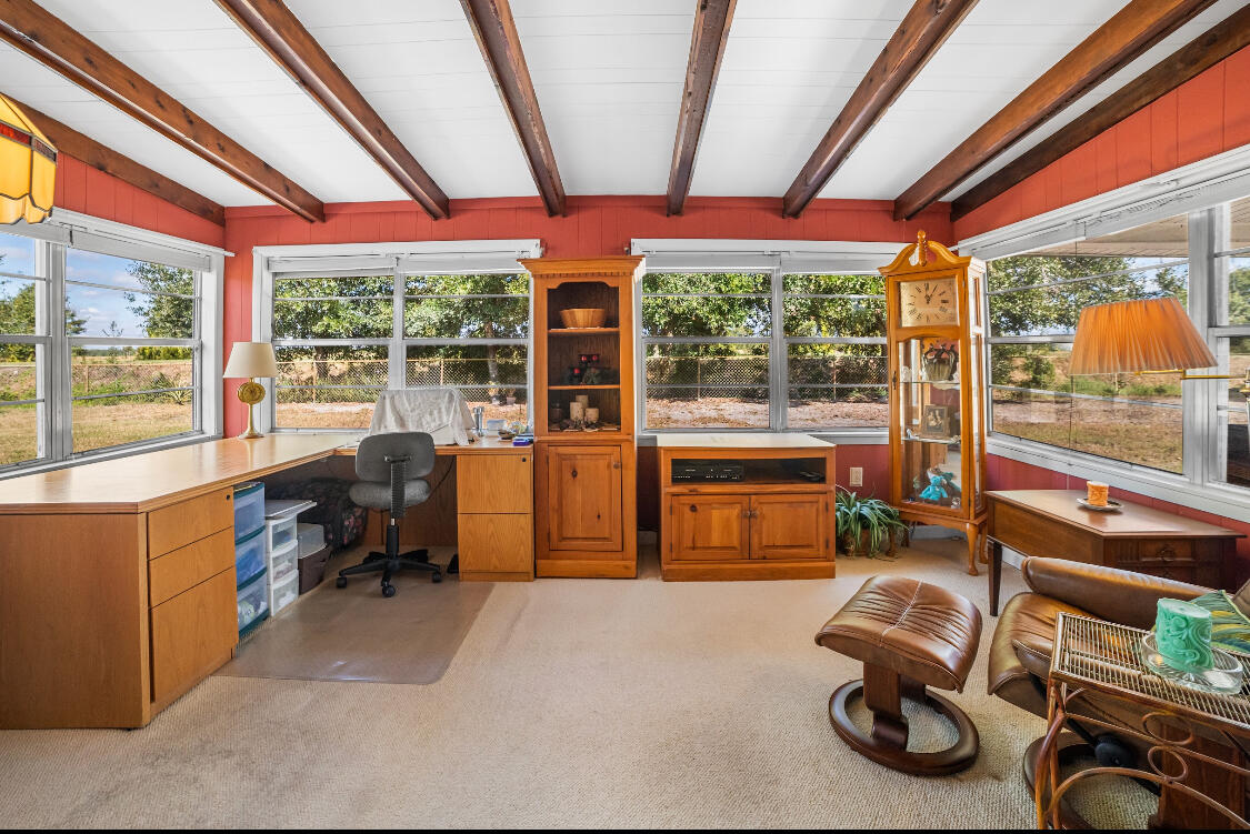 3966 Northwest 20th Avenue Okeechobee, FL 34972 - Photo 7 of 35 a room with furniture and a large window