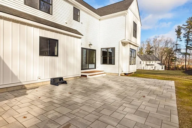 a view of a building with a snow on the road