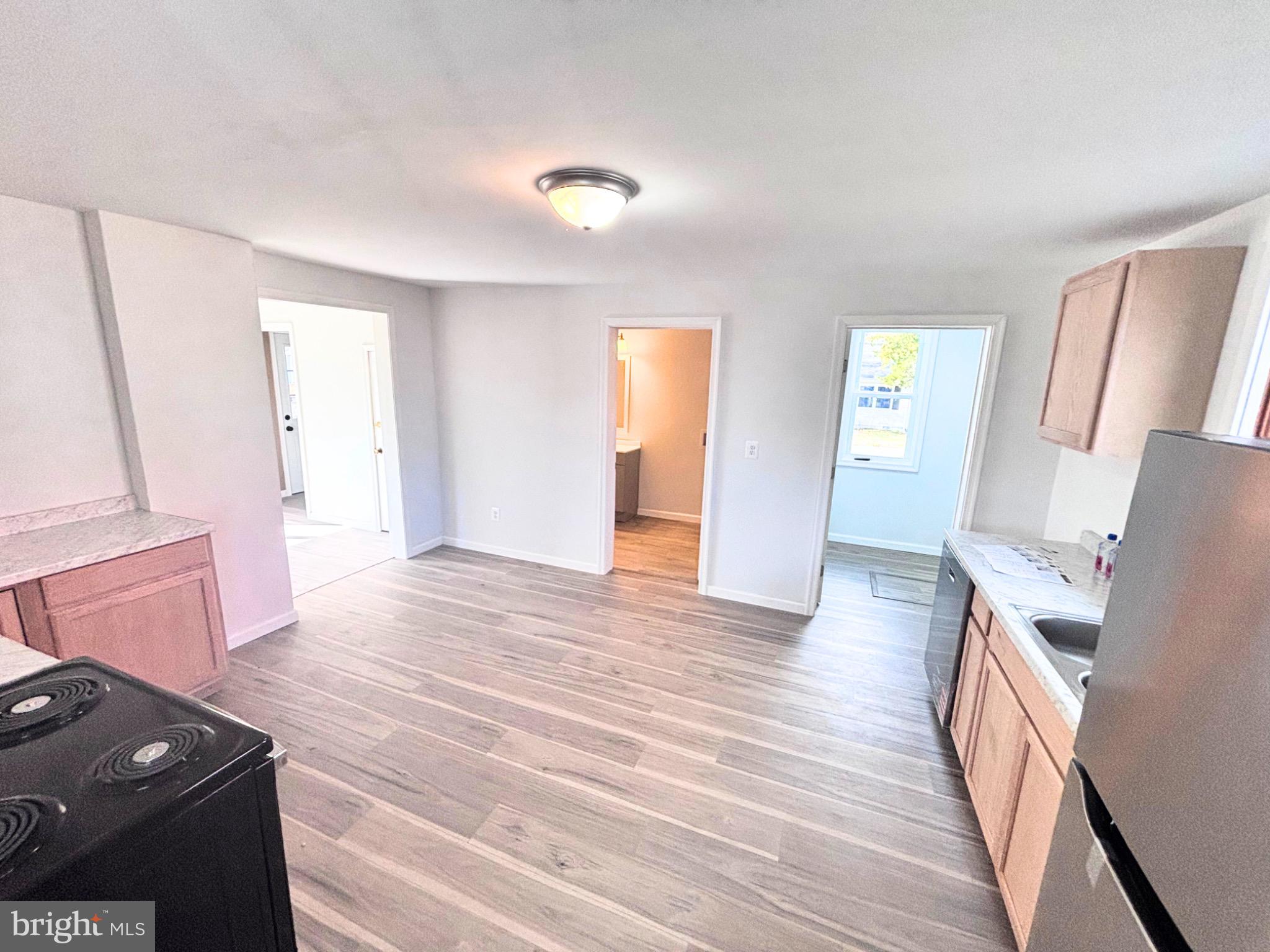 206 Academy Street Greensboro, MD 21639 - Photo 9 of 40 Bright and airy kitchen with modern finishes.