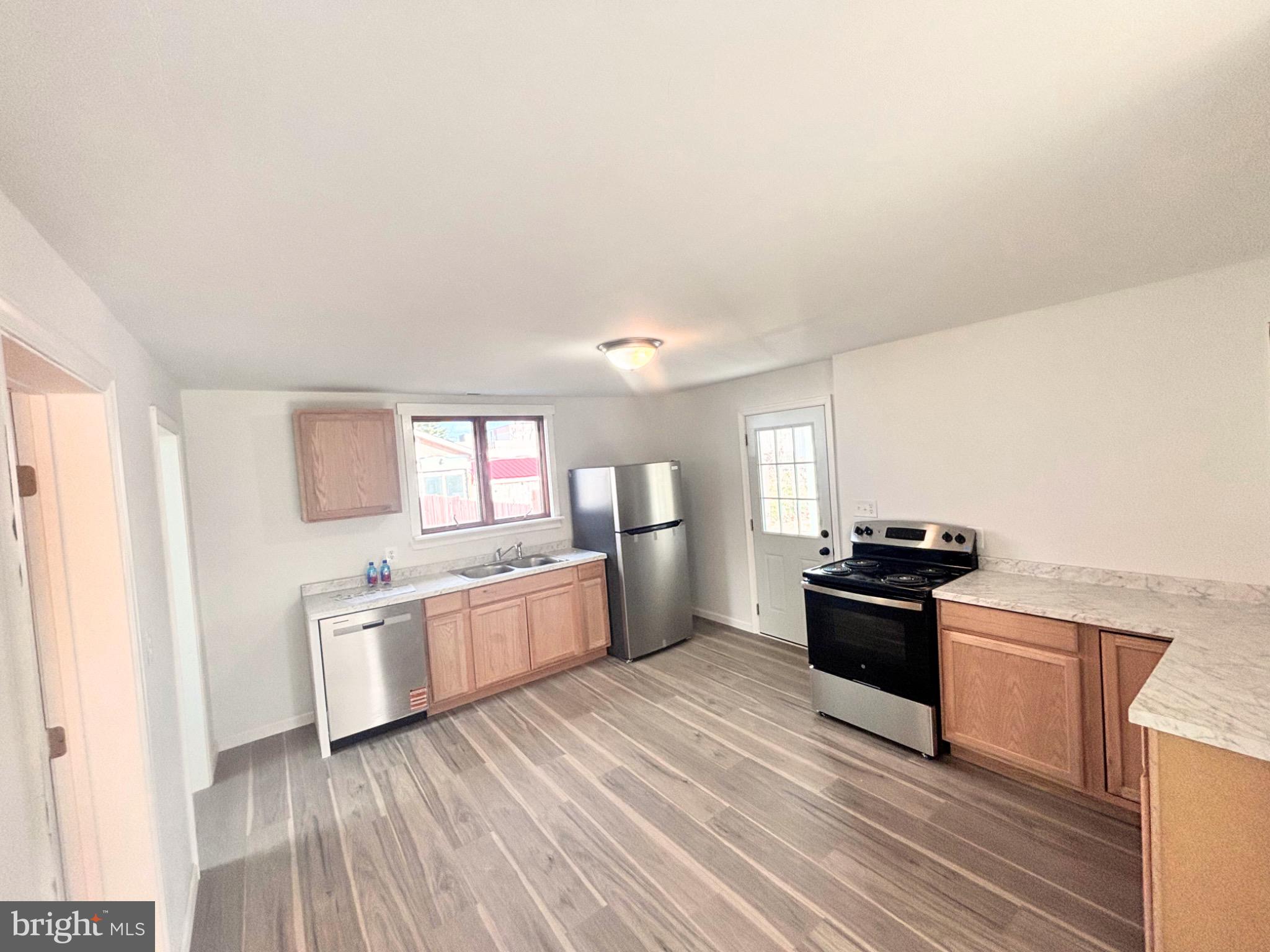 206 Academy Street Greensboro, MD 21639 - Photo 10 of 40 Bright and airy modern kitchen space.