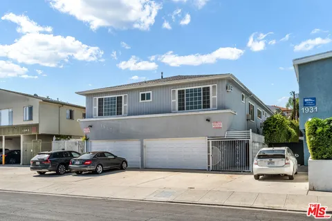 a car parked in front of a house