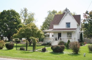 401 South Malta Road Malta, IL 60150 - Photo 1 of 25 a front view of house with a garden