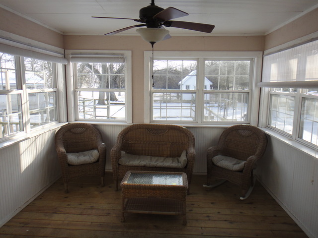 401 South Malta Road Malta, IL 60150 - Photo 16 of 25 a bedroom with furniture and a large window