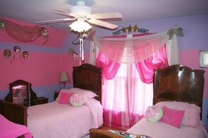 401 South Malta Road Malta, IL 60150 - Photo 18 of 25 a bedroom with a bed and a chandelier