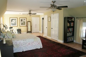 401 South Malta Road Malta, IL 60150 - Photo 20 of 25 a spacious bedroom with a bed dresser and a window