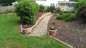 401 South Malta Road Malta, IL 60150 - Photo 22 of 25 a view of a backyard with garden