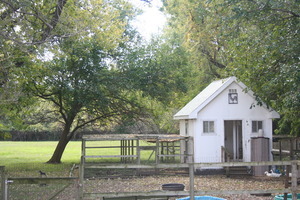 401 South Malta Road Malta, IL 60150 - Photo 23 of 25 a house with trees in the background