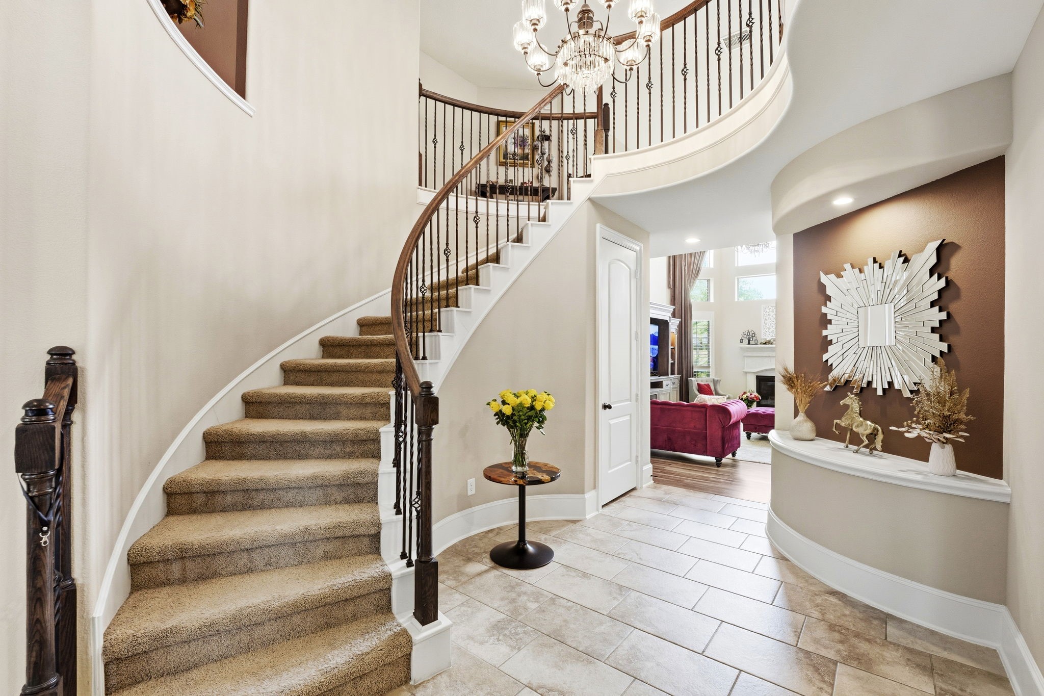 27383 Pendleton Trace Drive Spring, TX 77386 - Photo 3 of 33 Stunning spiral staircase as you enter home.