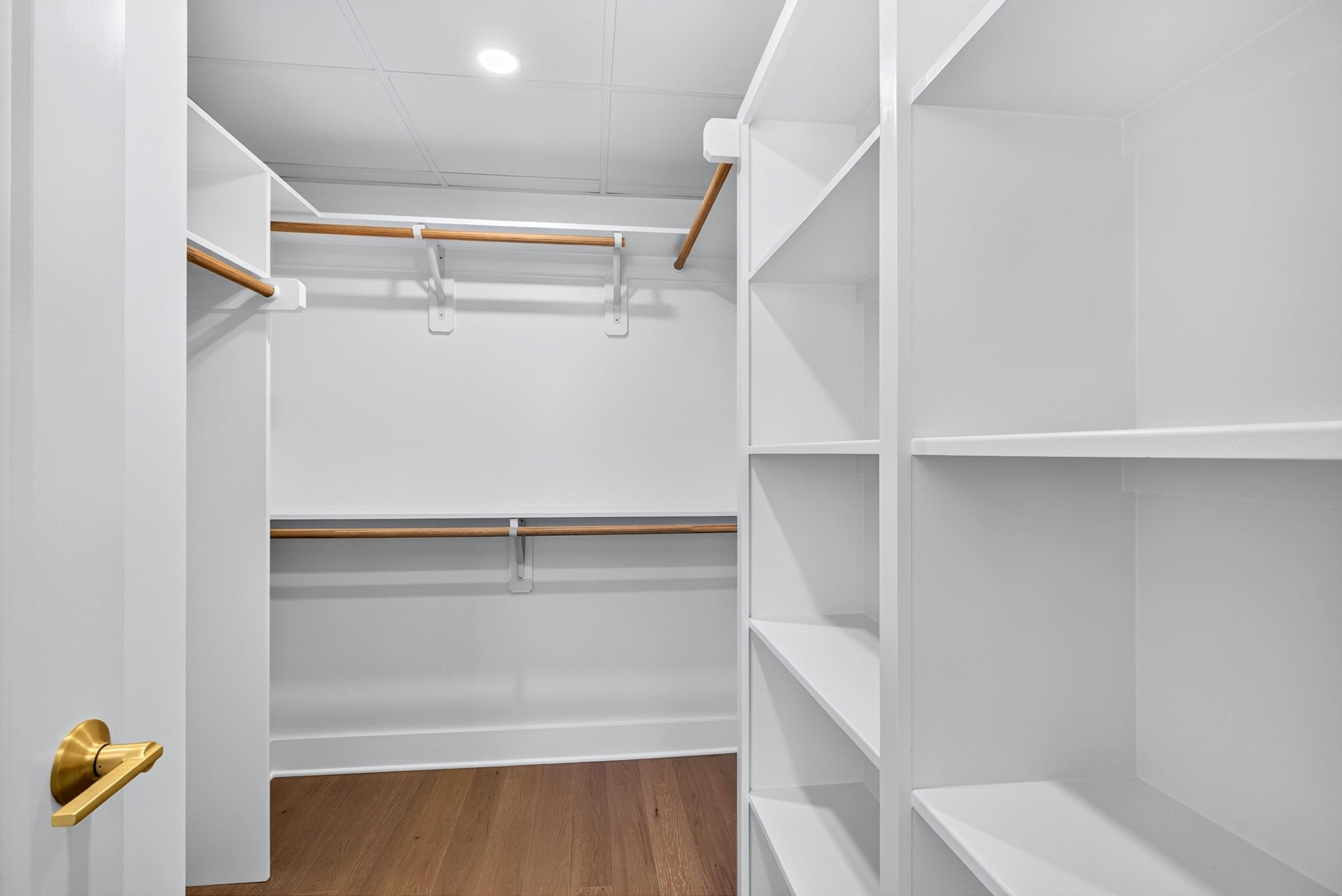 407 Chatham View Road Cary, NC 27511 - Photo 41 of 77 Wooden shelves in walk in closet