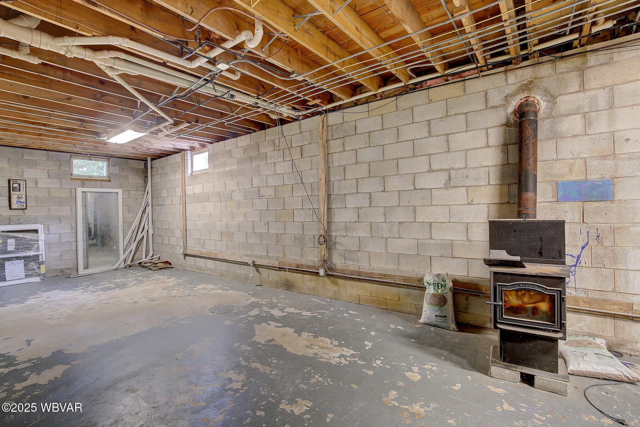 260 Selkirk Road Williamsport, PA 17701 - Photo 41 of 55 Basement w Pellet Stove