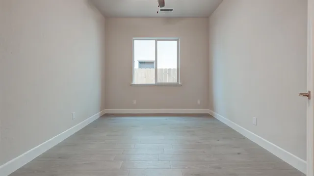 an empty room with a window
