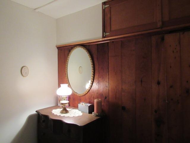 7 Knollview Road, Unit D Buzzards Bay, MA 02532 - Photo 11 of 22 a bathroom with a sink a mirror and vanity