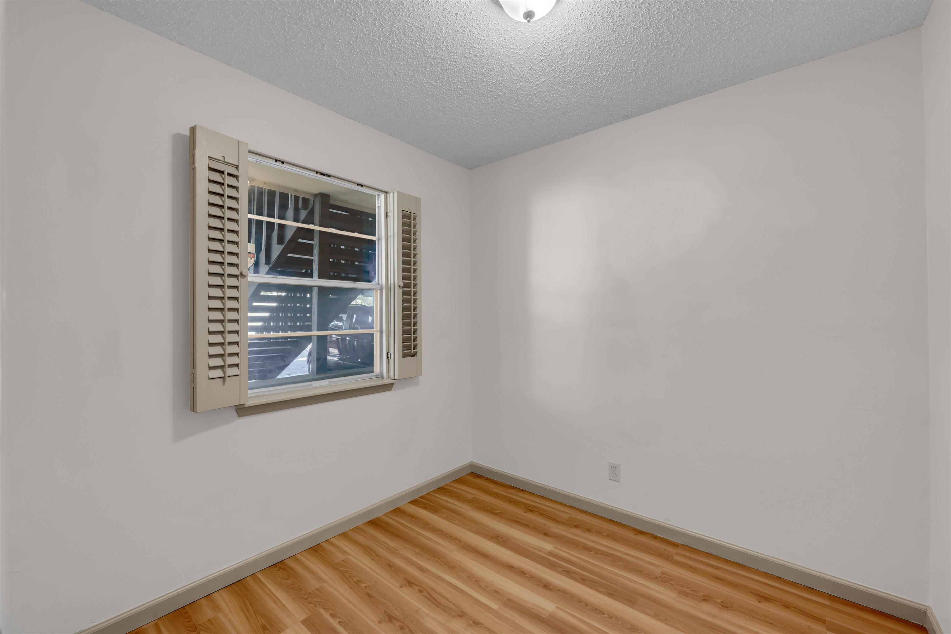 1206 Hi Stirrup Horseshoe Bay, TX 78657 - Photo 19 of 25 a view of an empty room with a window