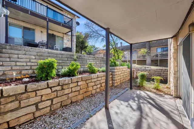 a bedroom with windows
