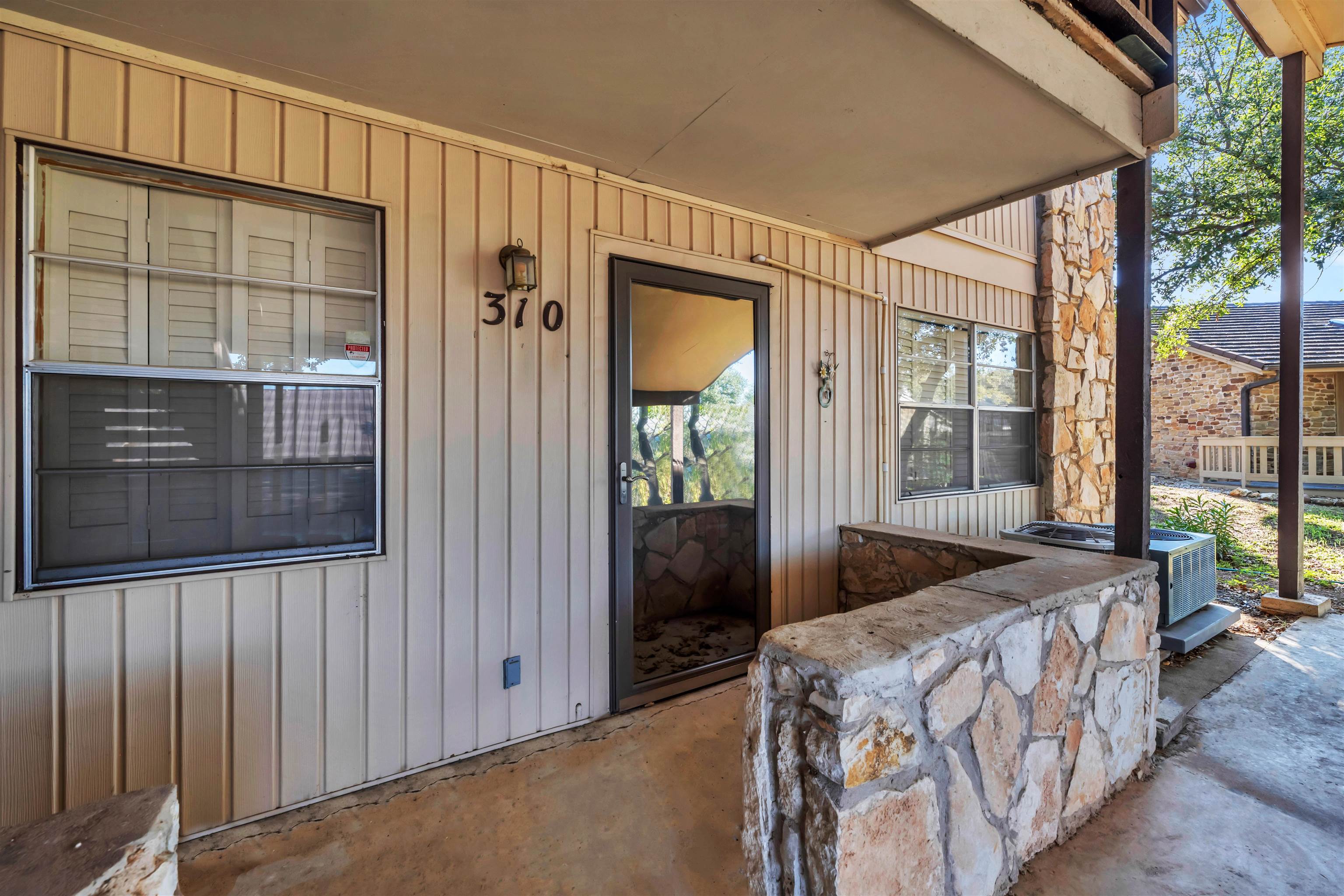 1206 Hi Stirrup Horseshoe Bay, TX 78657 - Photo 24 of 25 a bedroom with windows