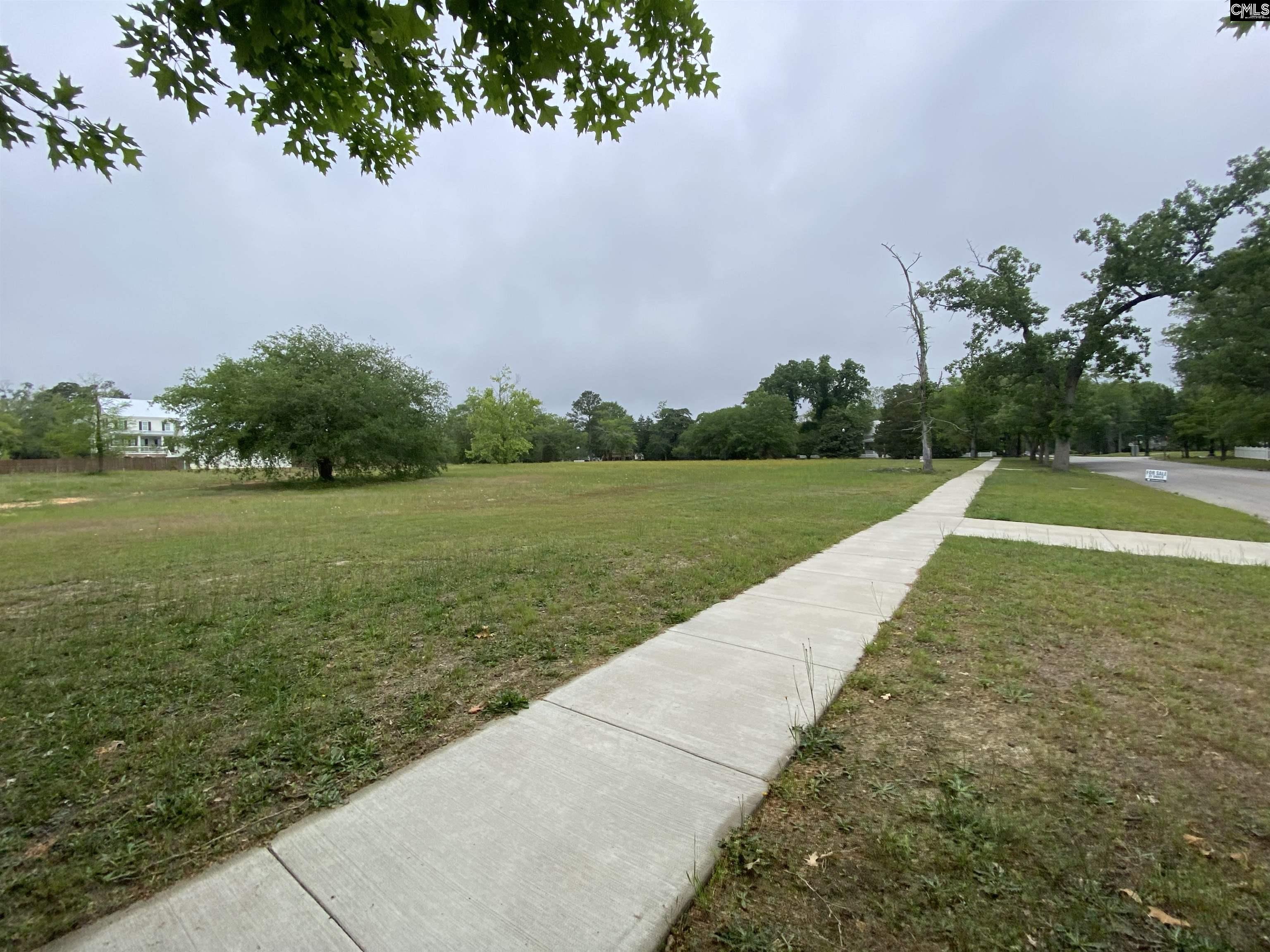 1305 Fair Street Camden, SC 29020 - Photo 5 of 7 a view of a field with an trees
