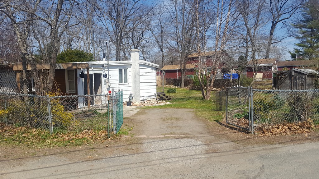 26 Bluemer Road Southampton, MA 01073 - Photo 2 of 5 a view of a park with pathway