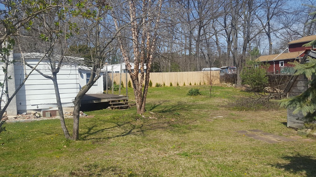 26 Bluemer Road Southampton, MA 01073 - Photo 3 of 5 a view of backyard with table and chairs