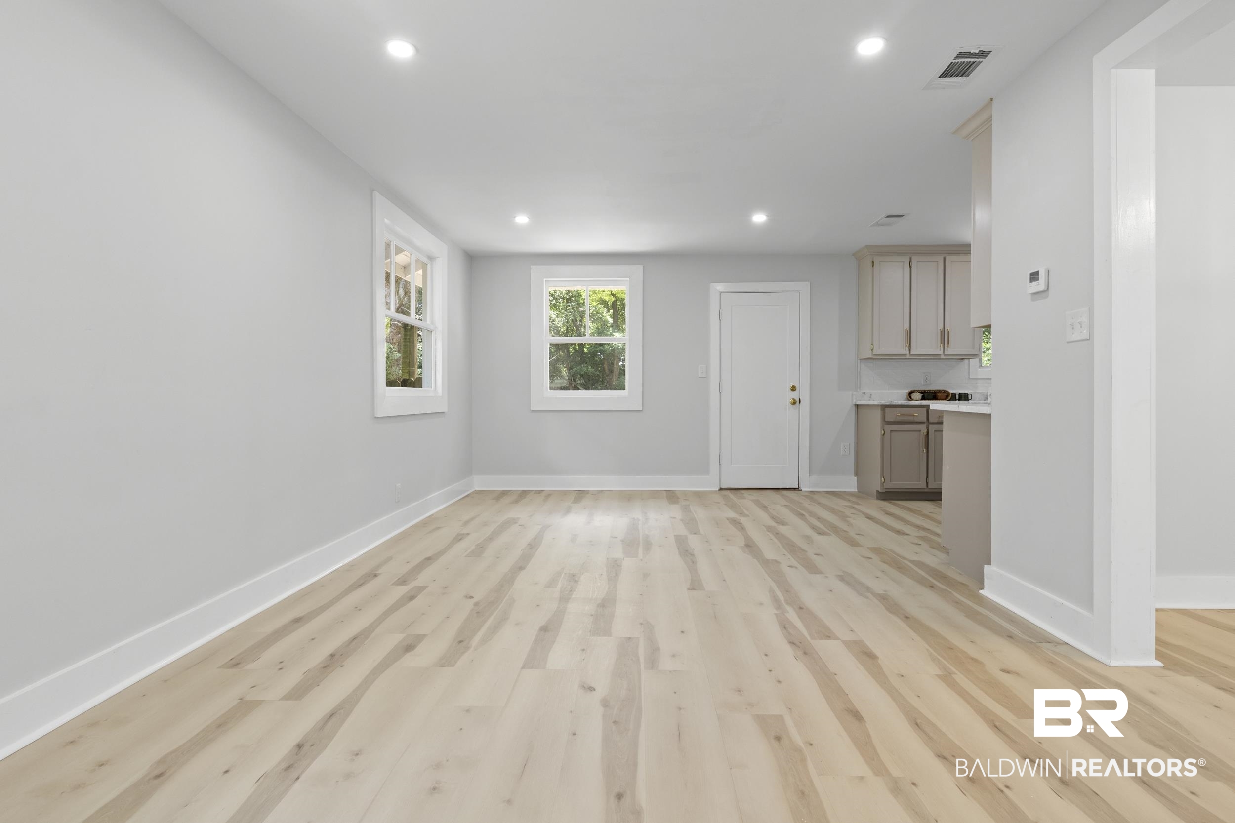315 Park Avenue Mobile, AL 36607 - Photo 14 of 27 Unfurnished living room featuring light hardwood / wood-style flooring