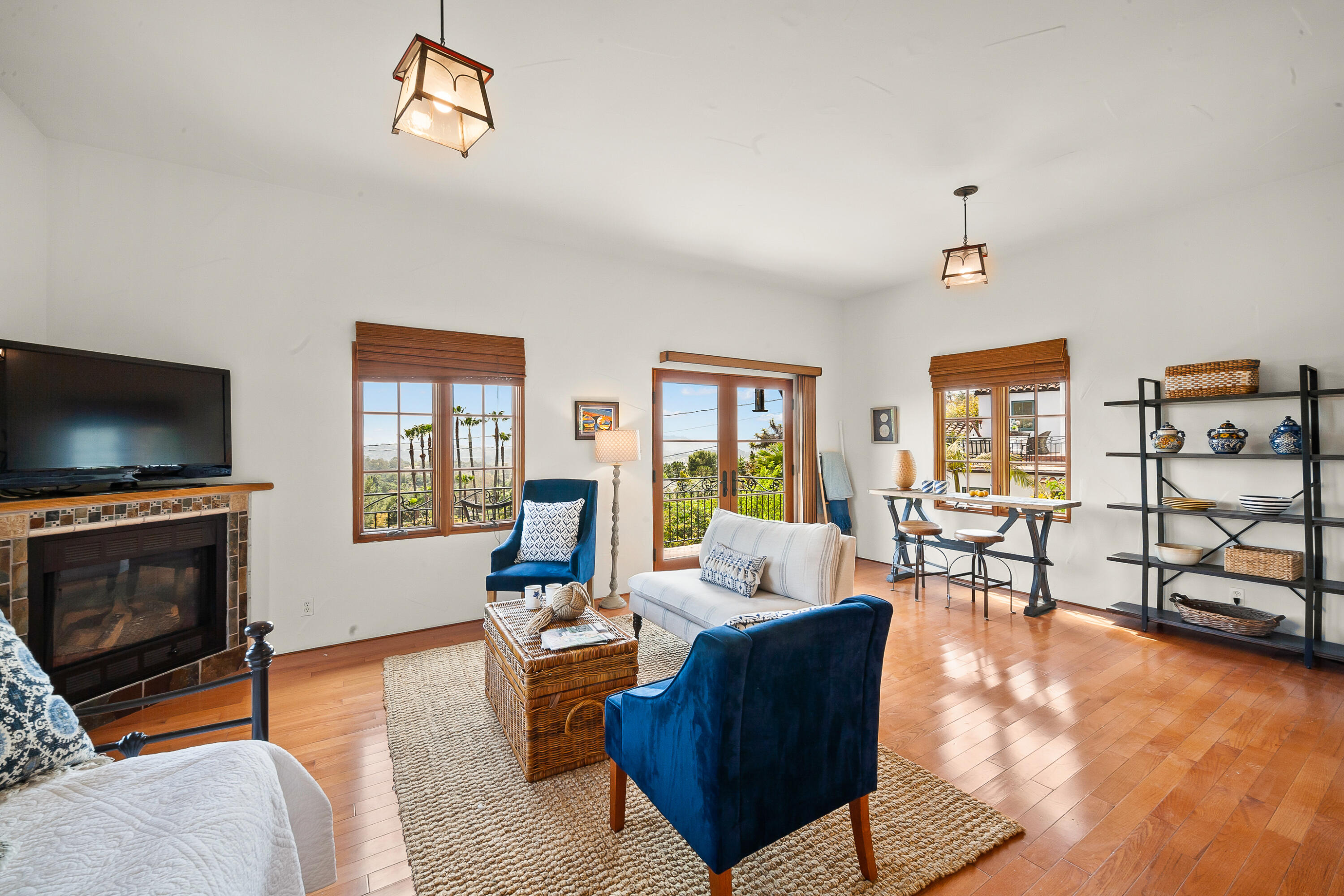 870 Windsor Way Santa Barbara, CA 93105 - Photo 15 of 59 a living room with furniture a flat screen tv and a window