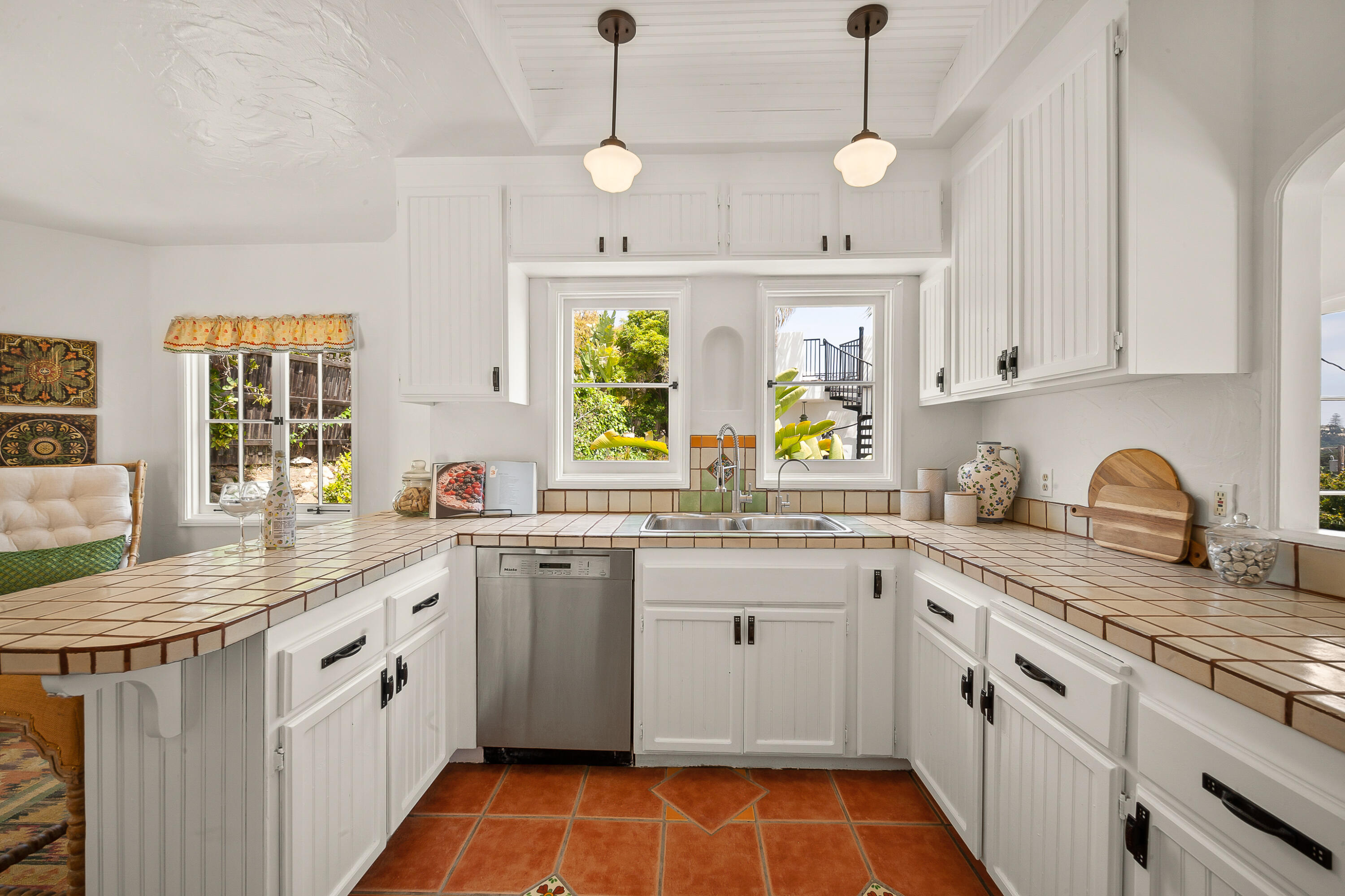 870 Windsor Way Santa Barbara, CA 93105 - Photo 32 of 59 a kitchen with a sink stove and window