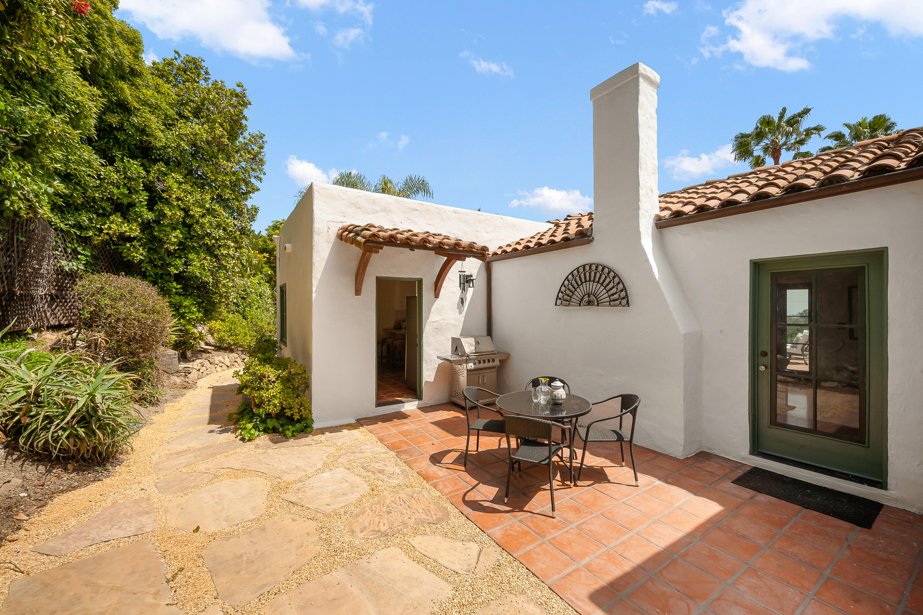870 Windsor Way Santa Barbara, CA 93105 - Photo 46 of 59 a view of a dinning room with a table and chairs