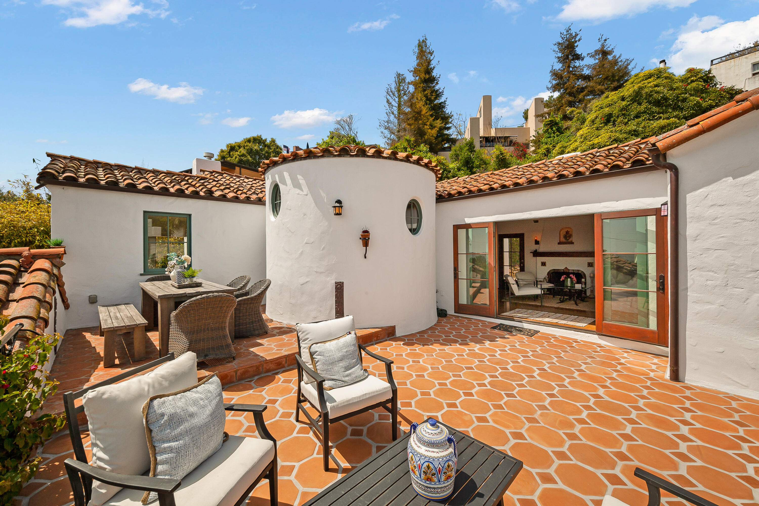 870 Windsor Way Santa Barbara, CA 93105 - Photo 6 of 59 a view of a patio with table and chairs and potted plants