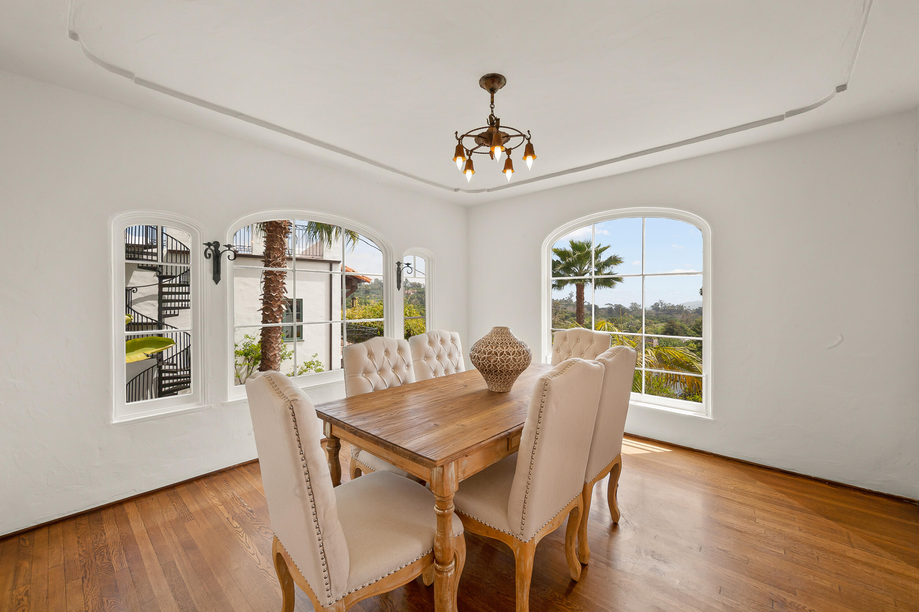 870 Windsor Way Santa Barbara, CA 93105 - Photo 7 of 59 a view of a dining room with furniture wooden floor and chandelier