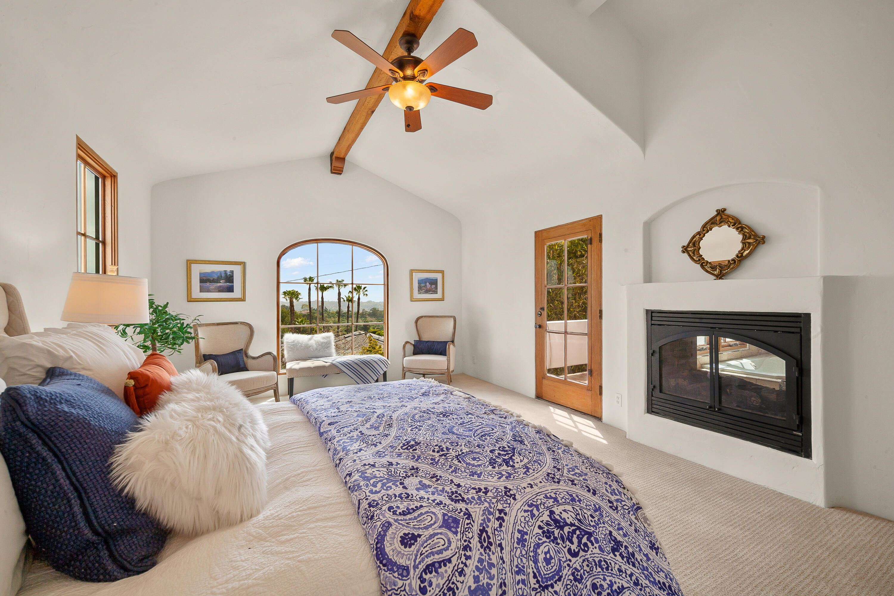 870 Windsor Way Santa Barbara, CA 93105 - Photo 9 of 59 a living room with furniture a fireplace and a window