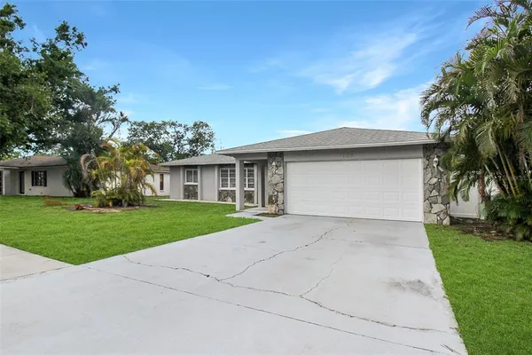 front view of a house with a yard