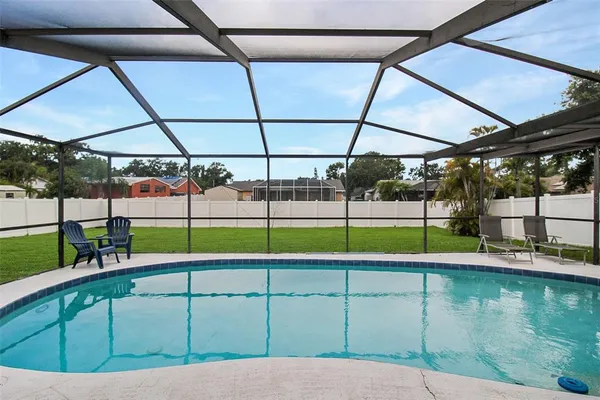 a view of a swimming pool with a porch