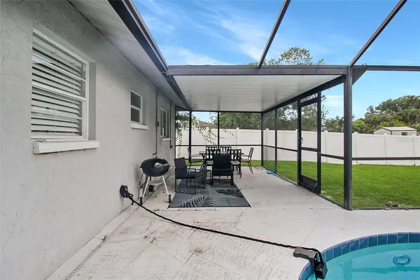 a view of a porch with furniture