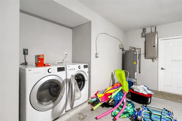 a utility room with dryer and washer