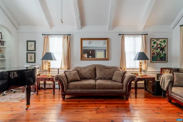 a kitchen with a stove a sink and a refrigerator