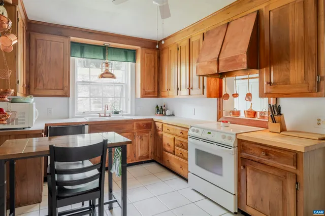a bedroom with a bed and a fireplace