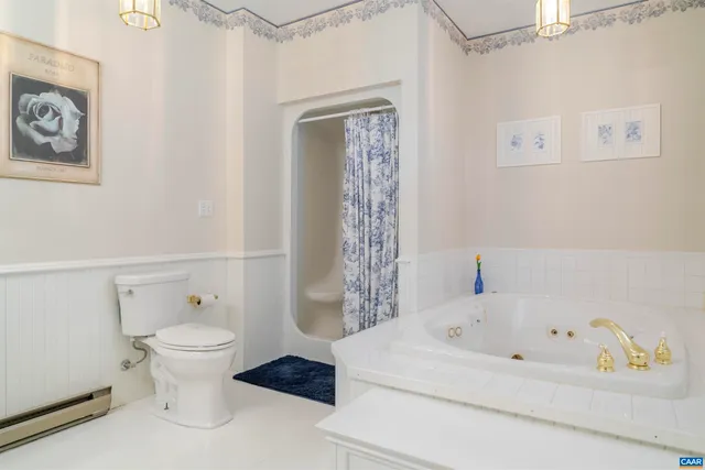 a bedroom with a bed and a night stand