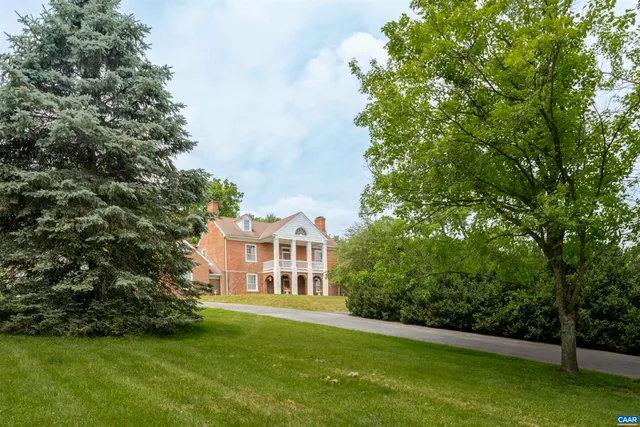 a view of a house with a big yard