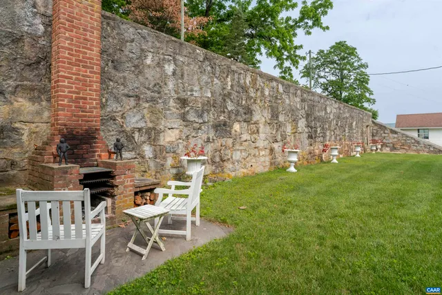 a view of a house with a big yard